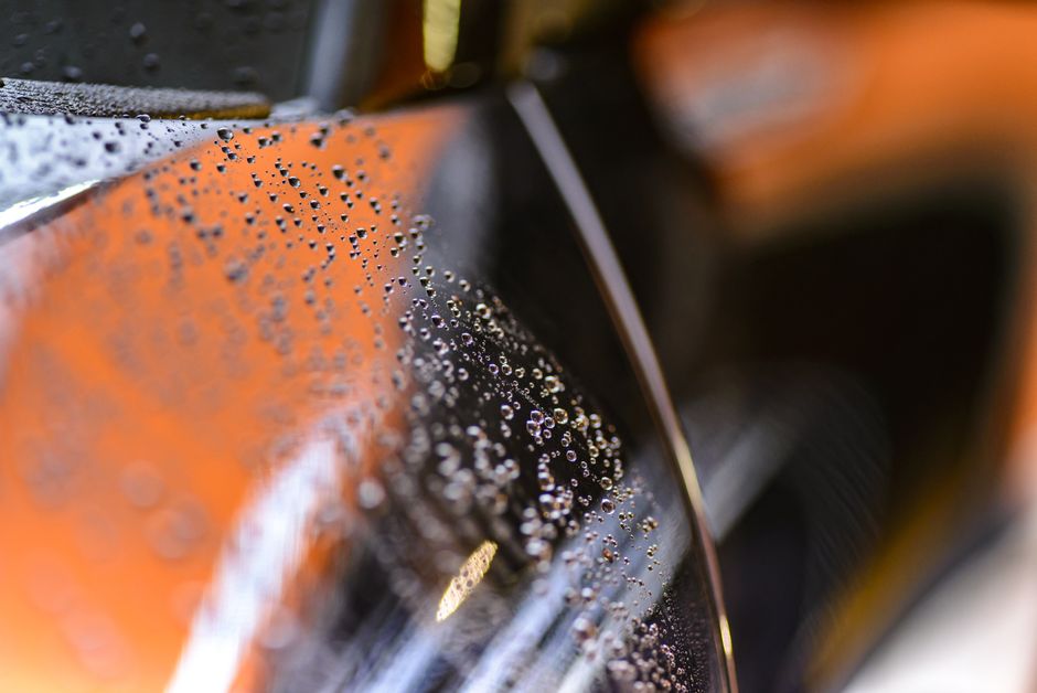 Water beading on a ceramic coated car hood